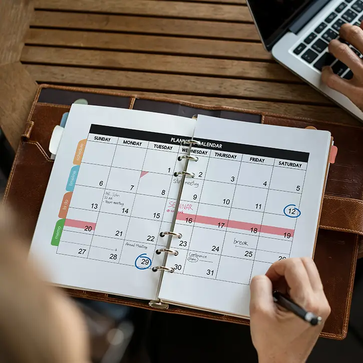 Looking down at a calendar of events.